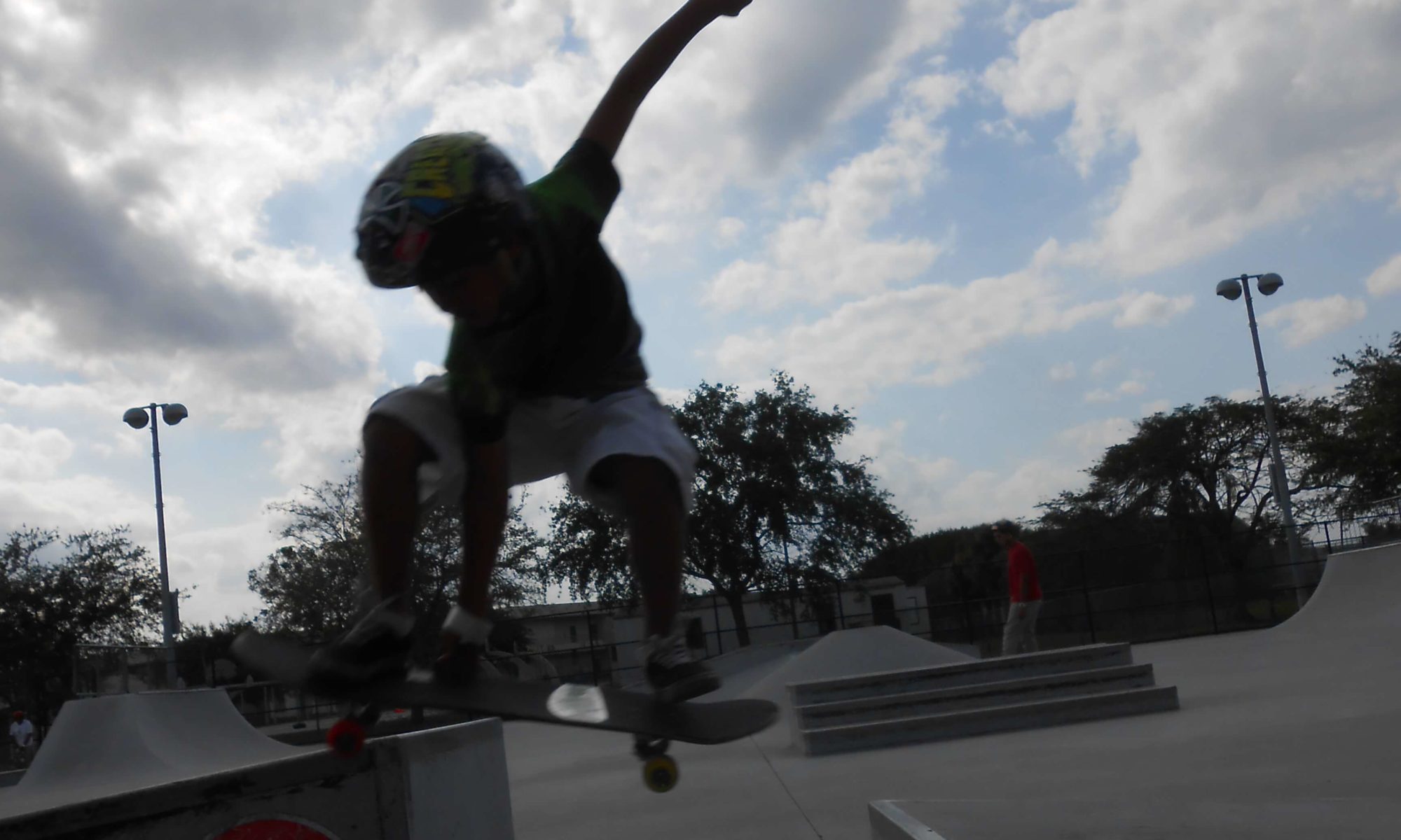 Jose Castillo, skater, off the kicker at Westwind Lakes Skate Park March 29, 2013
